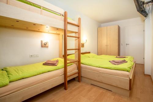 Ένα ή περισσότερα κρεβάτια σε δωμάτιο στο Chalet Central Top CC 1