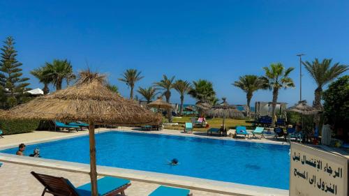 La alberca dentro o cerca de Hotel de charme et SPA Dar El Bhar