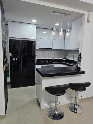 Kuchyň nebo kuchyňský kout v ubytování Apartamento Completo de Lujo con Aire Acondicionado