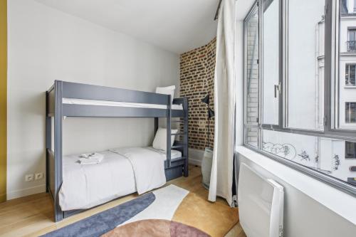 Krevet ili kreveti u jedinici u okviru objekta Amazing Montorgueil