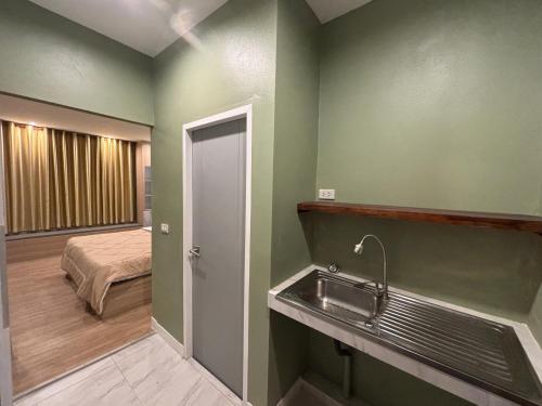 Ένα μπάνιο στο เดอเนส บูติก โฮมสเตย์ C8 Denest Boutique Homestay