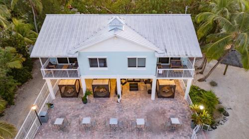 an aerial view of a house with a roof at Bayside Inn Key Largo in Key Largo