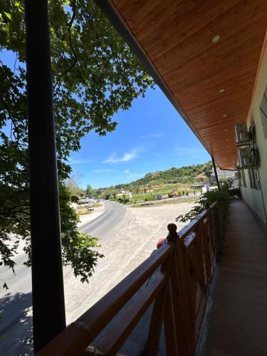 a view of the beach from the porch of a house at Bar Restaurant Hotel Gysi in Klos