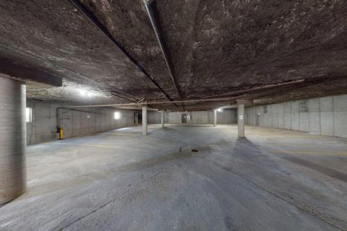 an empty parking lot in an empty parking garage at Platinum Studio Pool-Spa Ski-in out Gym, Sauna, Laundry, BBQ in Brian Head