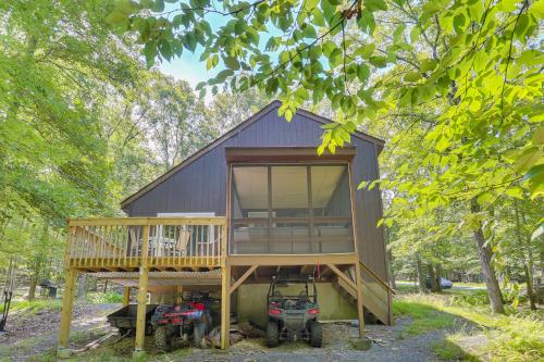 a large gambrel house with a large deck at Screened Porch and Deck Pet-Friendly Poconos Escape in Lackawaxen