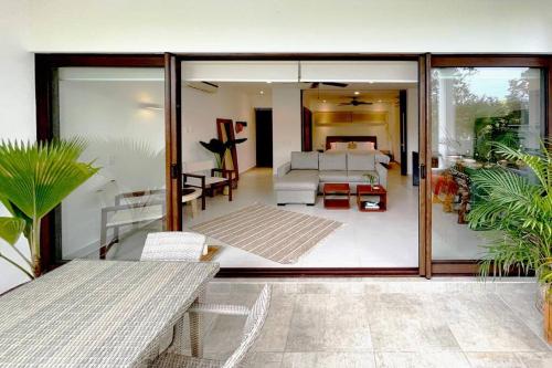 Postel nebo postele na pokoji v ubytování Tropical Escape