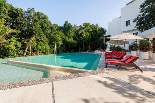 Bazén v ubytování Tropical Escape nebo v jeho okolí