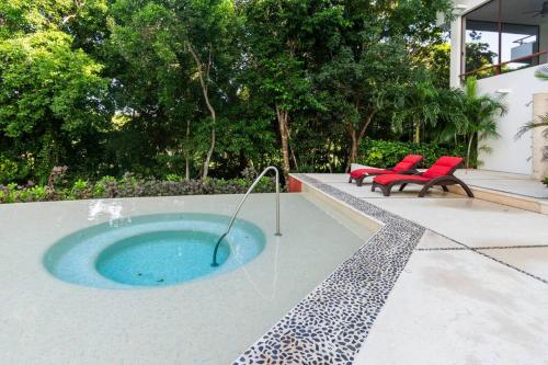 Bazén v ubytování Tropical Escape nebo v jeho okolí