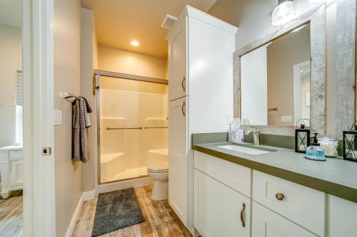 a bathroom with a sink and a toilet at Hot Tub and Deck Mtn-View Pine Getaway! in Pine