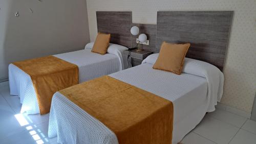 Postel nebo postele na pokoji v ubytování Casa Rivas