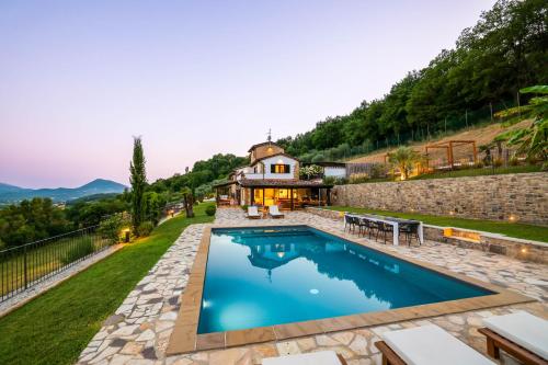 an estate with a swimming pool and a house at Villa Destino Italy, Umbria Tuscany boarder in Montone