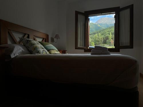 Ένα ή περισσότερα κρεβάτια σε δωμάτιο στο Apartamento La Calma