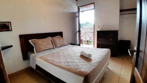 Ένα ή περισσότερα κρεβάτια σε δωμάτιο στο san carlos beach inn