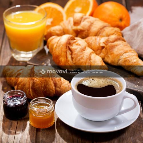 a cup of coffee and croissants and orange juice at Chez Maurizio in Villemanoche