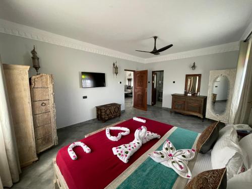 Letto o letti in una camera di Mizingani Seafront Hotel