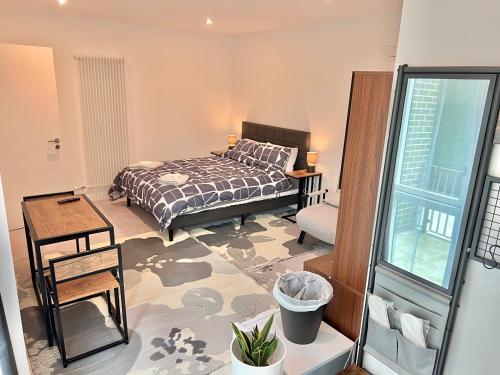 Ένα ή περισσότερα κρεβάτια σε δωμάτιο στο Lux New Studio Apartment Exel London