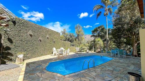 Bassein majutusasutuses Casa na serra com piscina või selle lähedal