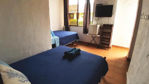 Ένα ή περισσότερα κρεβάτια σε δωμάτιο στο san carlos beach inn