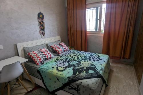 Ένα ή περισσότερα κρεβάτια σε δωμάτιο στο Heart of Casablanca Terrace Apartment