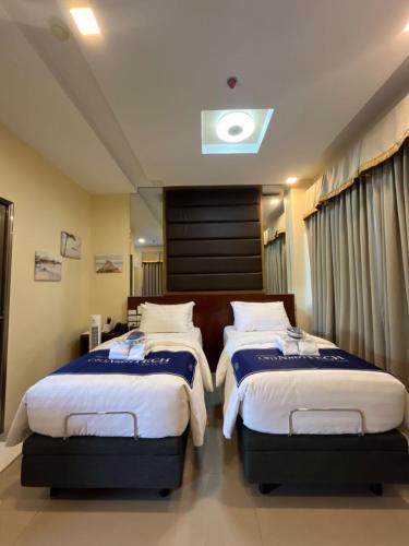 Katil atau katil-katil dalam bilik di NutriTECH Hotels & Events