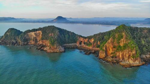 an aerial view of an island in the water at Happy Journey Homestay Mersing in Mersing