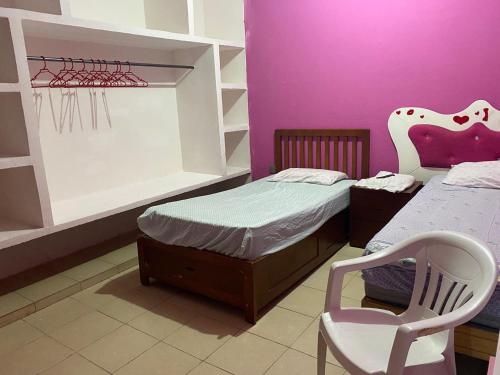 Postel nebo postele na pokoji v ubytování Hostal MJ