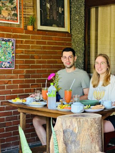 a man and a woman sitting at a table at La Casa Bella in Ella