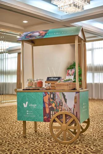 a cart that is sitting on a floor at Village Hotel Bugis by Far East Hospitality in Singapore