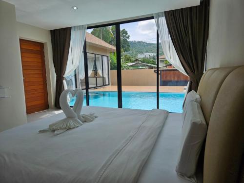 Kolam renang di atau dekat dengan Baan First Pool Villa