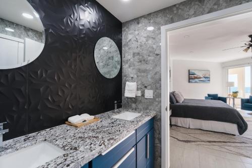 Un ou plusieurs lits dans un hébergement de l'établissement Villa 15 Beachfront Playa Azul Resort