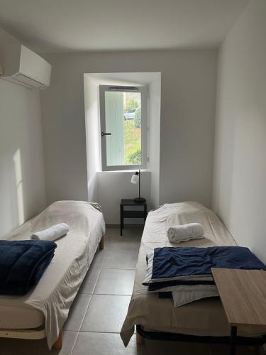 Postel nebo postele na pokoji v ubytování Camilette