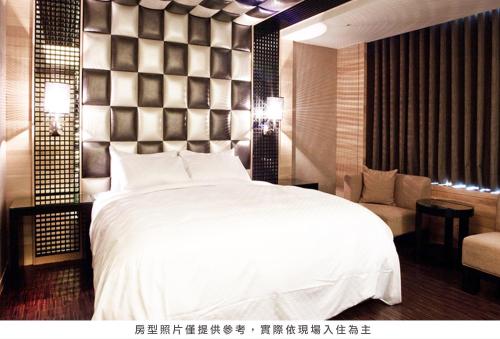 Katil atau katil-katil dalam bilik di Royal Group Hotel Chang Chien Branch