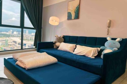 Χώρος καθιστικού στο Continew Residence Cozy Suite by GUESTONIC