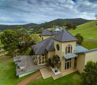 an aerial view of a large house with a roof at Sutherland Estate - Stunning Yarra Valley Vineyard in Dixons Creek