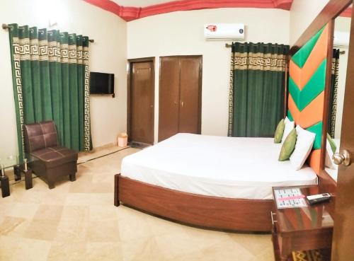 Postel nebo postele na pokoji v ubytování Subhan Palace Guest House