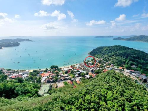 an island with a red circle in the middle of the water at At the Beach Spacious 2-level Design Home for 2-5 and 1 infant, Ao Yon Beach Phuket in Ban Ao Makham