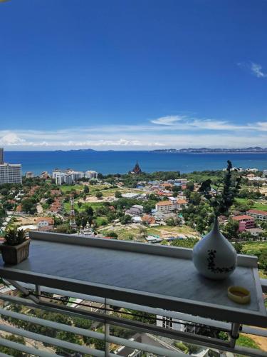 a view of the city from the balcony of a house at Art Under the Clouds 32nd floor sea view SuperHost in North Pattaya