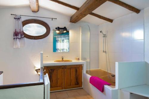 a bathroom with a sink and a shower at Villa Cabris by Villa Plus in Cabris