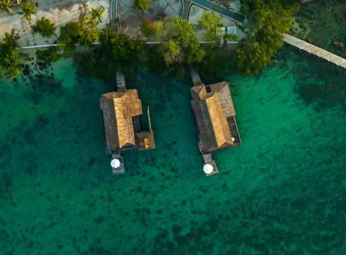 an overhead view of two buildings in the water at Full Moon Island Resort in Kaoh Sdach