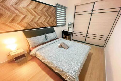 Ένα ή περισσότερα κρεβάτια σε δωμάτιο στο Continew Residence Cozy Suite by GUESTONIC