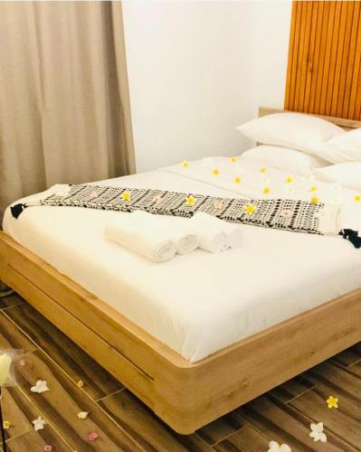 Postel nebo postele na pokoji v ubytování Moya Résidence by MD