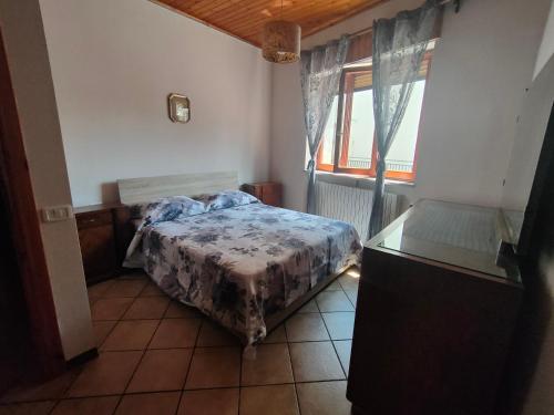 Postel nebo postele na pokoji v ubytování Casetta San Rocco