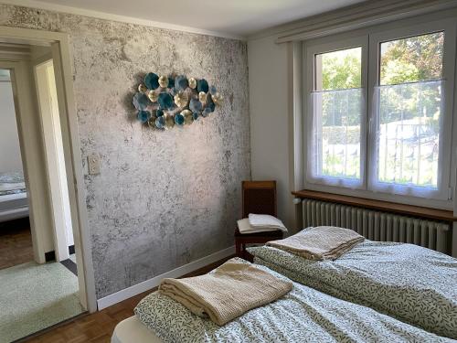 Postel nebo postele na pokoji v ubytování Wohnung in 100 J Bauernhaus