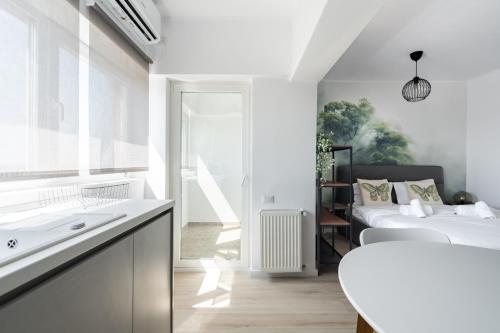 En eller flere senge i et værelse på Primaveri Sunset 1112