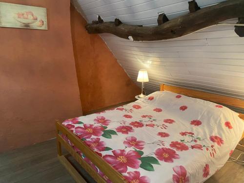 Ένα ή περισσότερα κρεβάτια σε δωμάτιο στο Le petit cottage