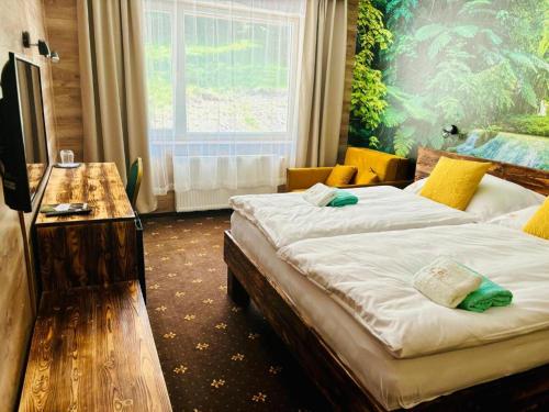 TV a/nebo společenská místnost v ubytování Hotel Raj