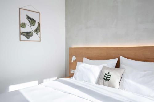 Кровать или кровати в номере Botanique Hotel Prague