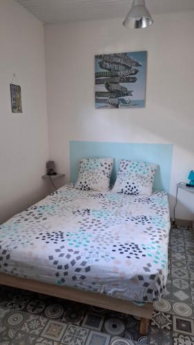 En eller flere senge i et værelse på Le Havre du Voyageur - le Balaou