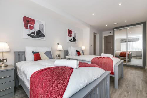 Ένα ή περισσότερα κρεβάτια σε δωμάτιο στο Maple Lodge