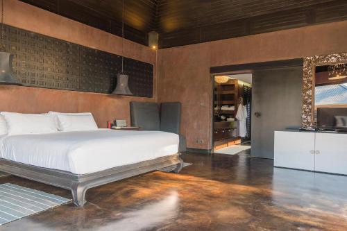 Ένα ή περισσότερα κρεβάτια σε δωμάτιο στο Villa Saanti